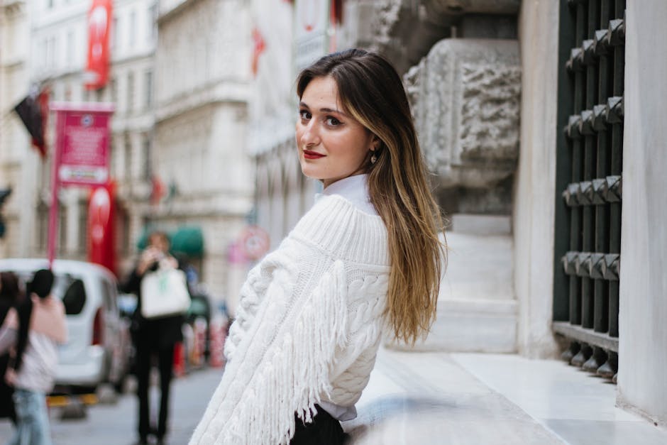 Stylish woman in İstanbul street showcasing modern urban fashion and city vibes.